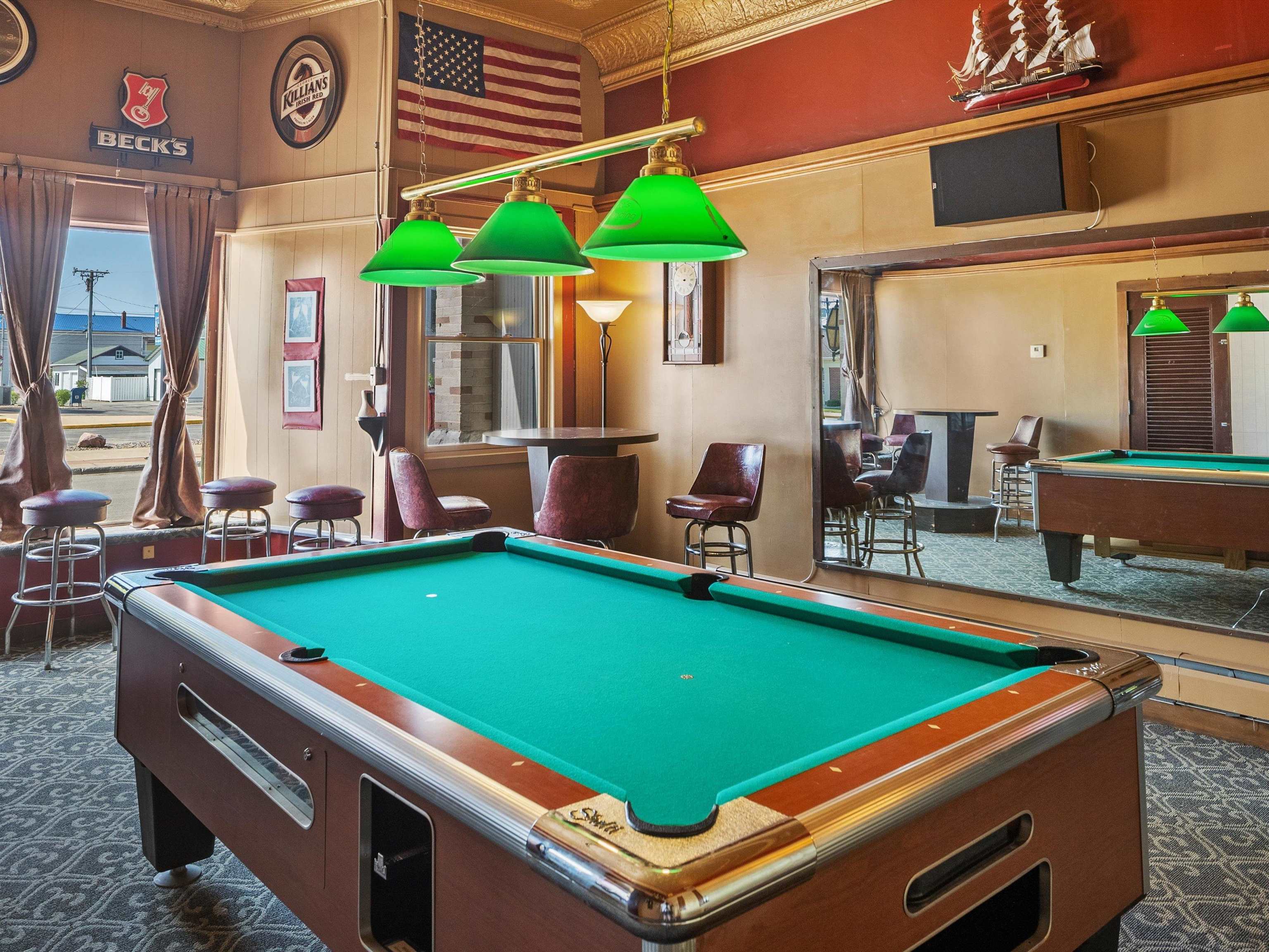Table top for pool table allows hosting hors 'd oeuvre parties for private functions