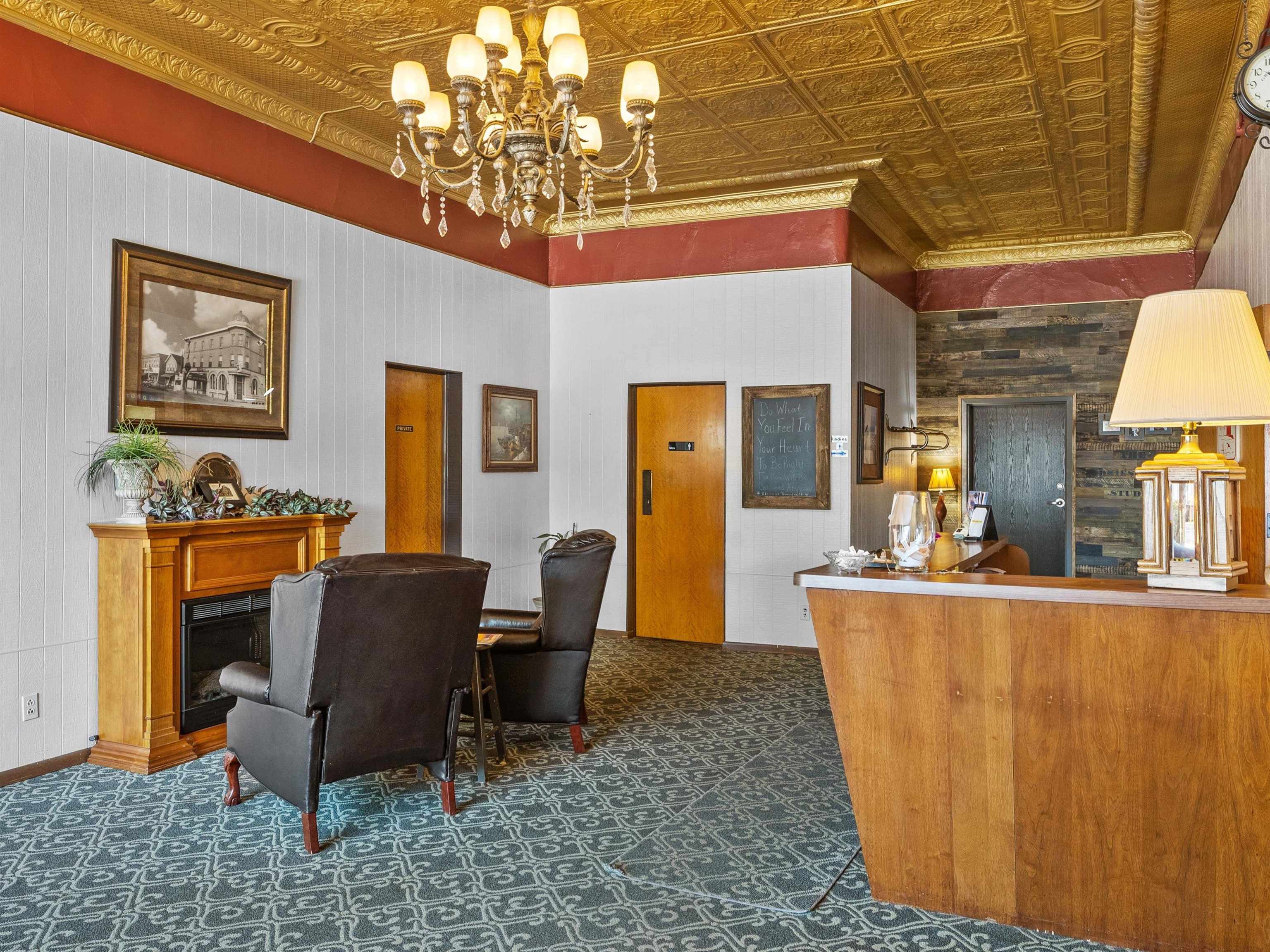 Lobby entrance with original 1904 tin ceiling to welcome guests