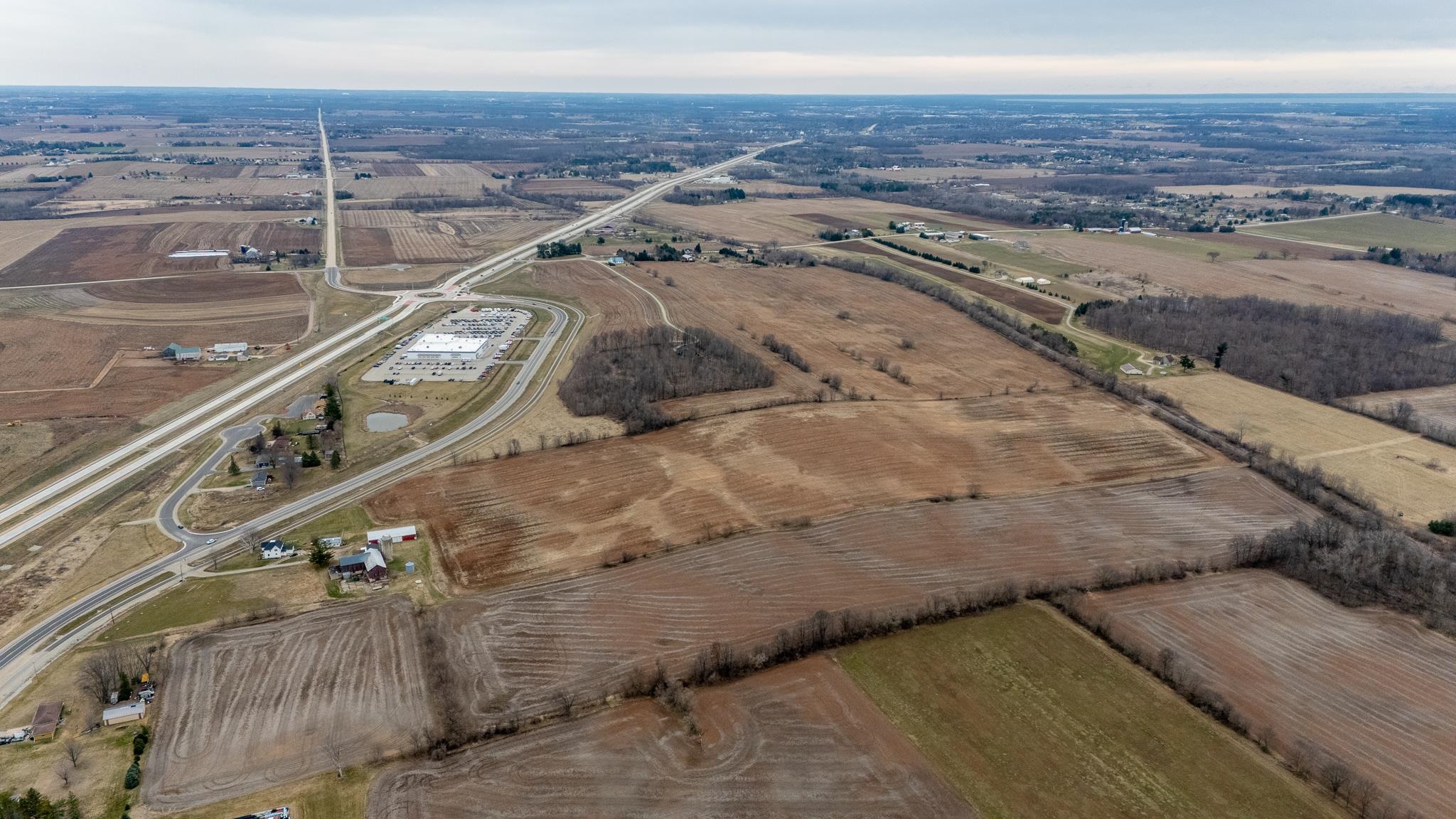 All World Ford Dealership shown in Distance