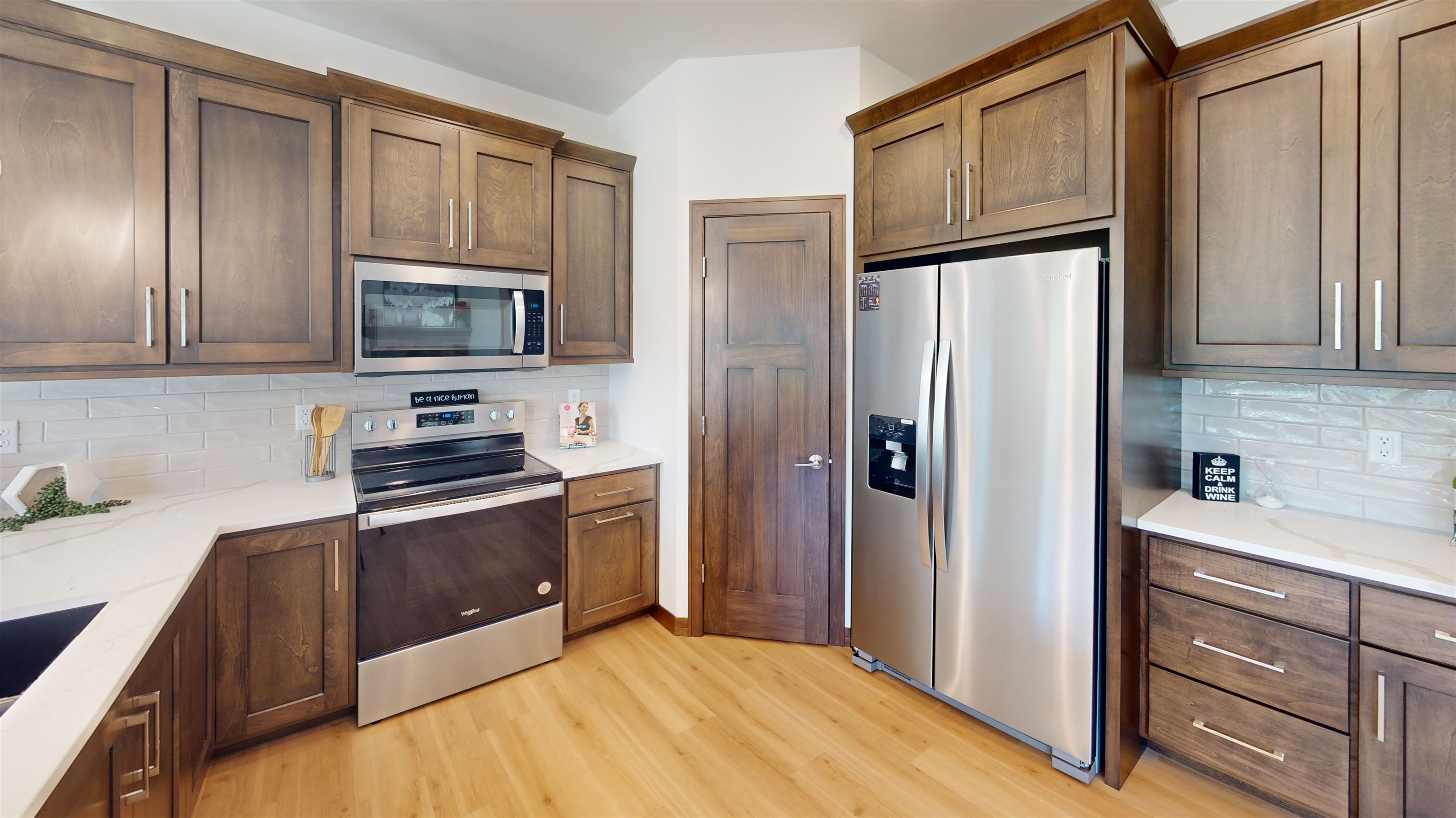 Cabinet color is "truffle" with corner pantry. Plan is mirrored