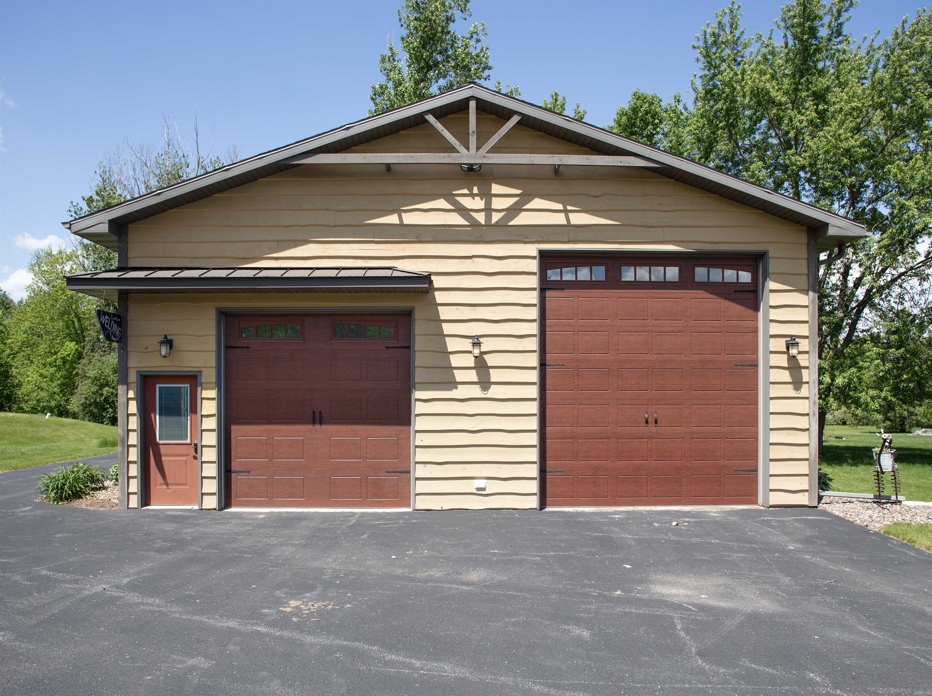 Shop built in 2013 36'X44'. 7-ft, 10ft, 13ft doors, High efficiency forcd-air furnace & AC, 1/2 bath