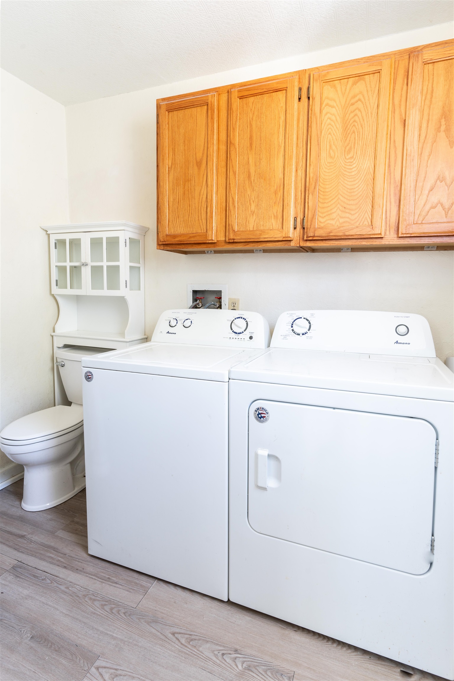 Half bath and laundry room.