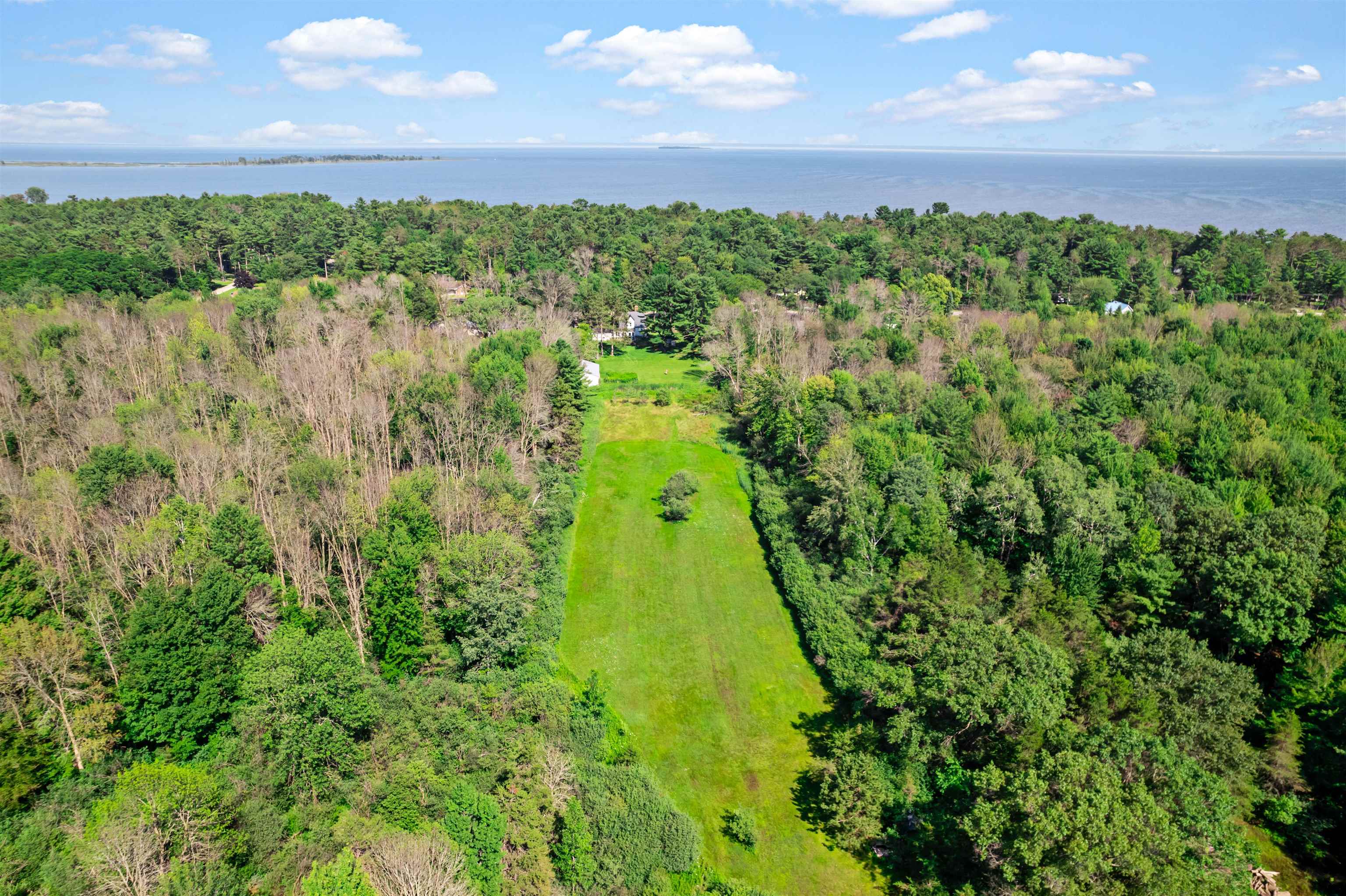 Aerial shows the lot from the back. Notice proximity to the bay, Seagull Bar, and Green Island.