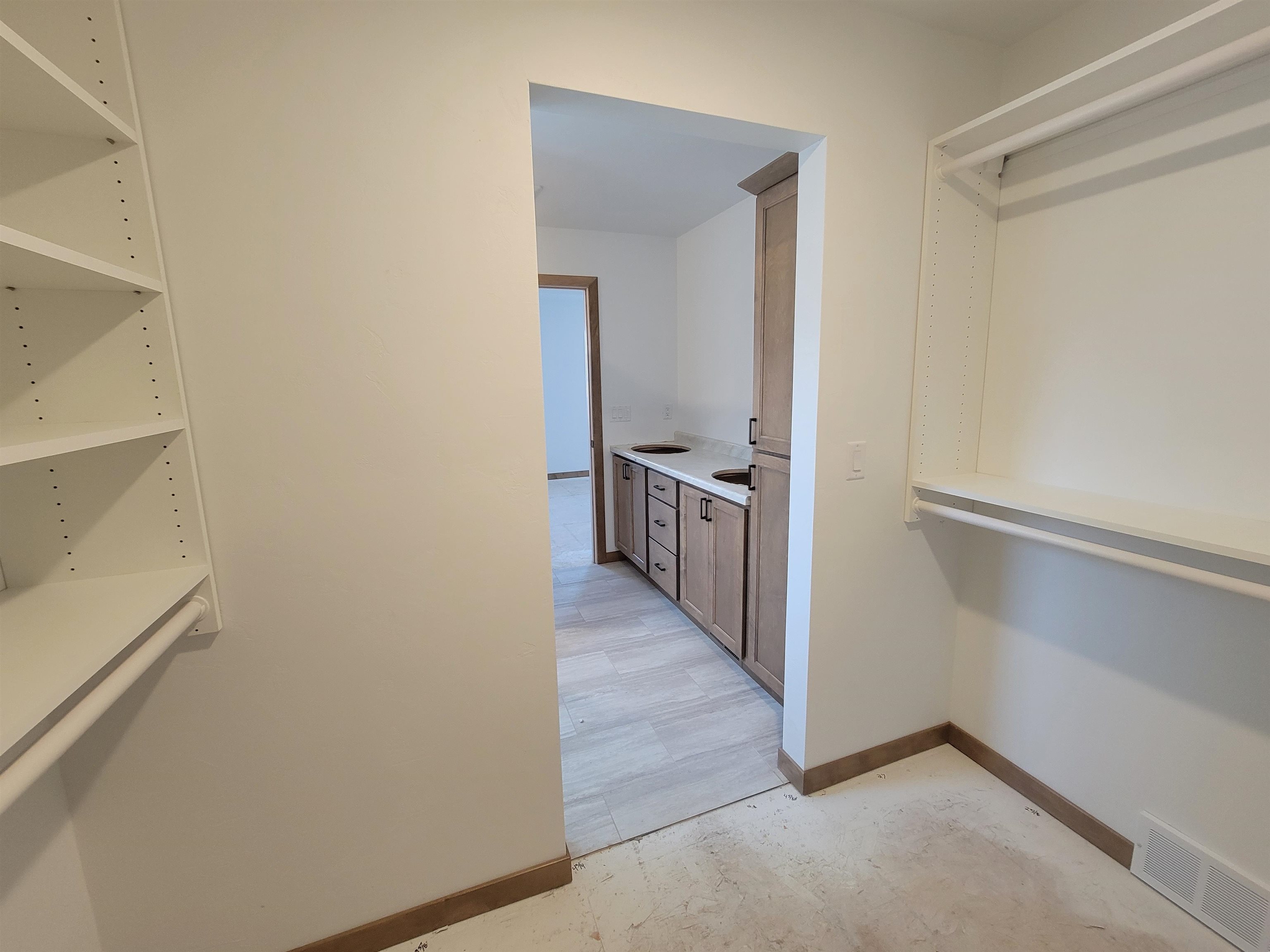 View into the bathroom from the walk in closet