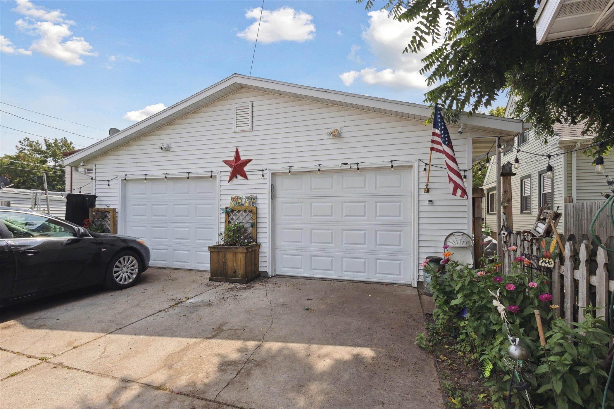 Attached garage on back side of duplex. 1 stall for each side.