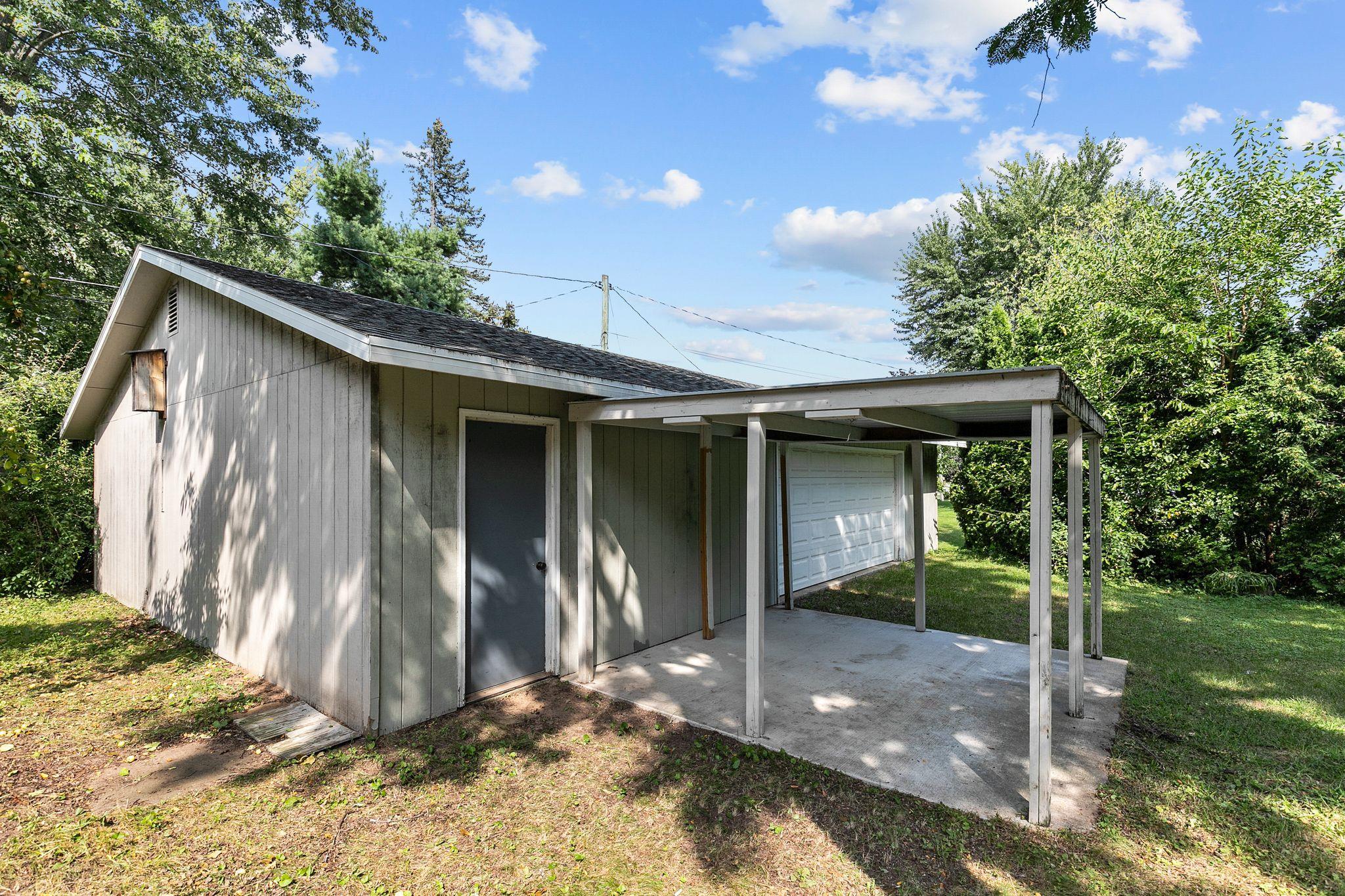 The massive detached garage provides unlimited possibilities