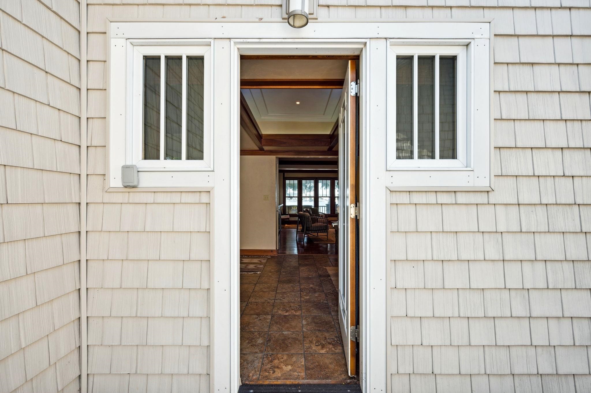 Back Entry off of Texas Street. Both front and back entry meet in this foyer with coat closet.