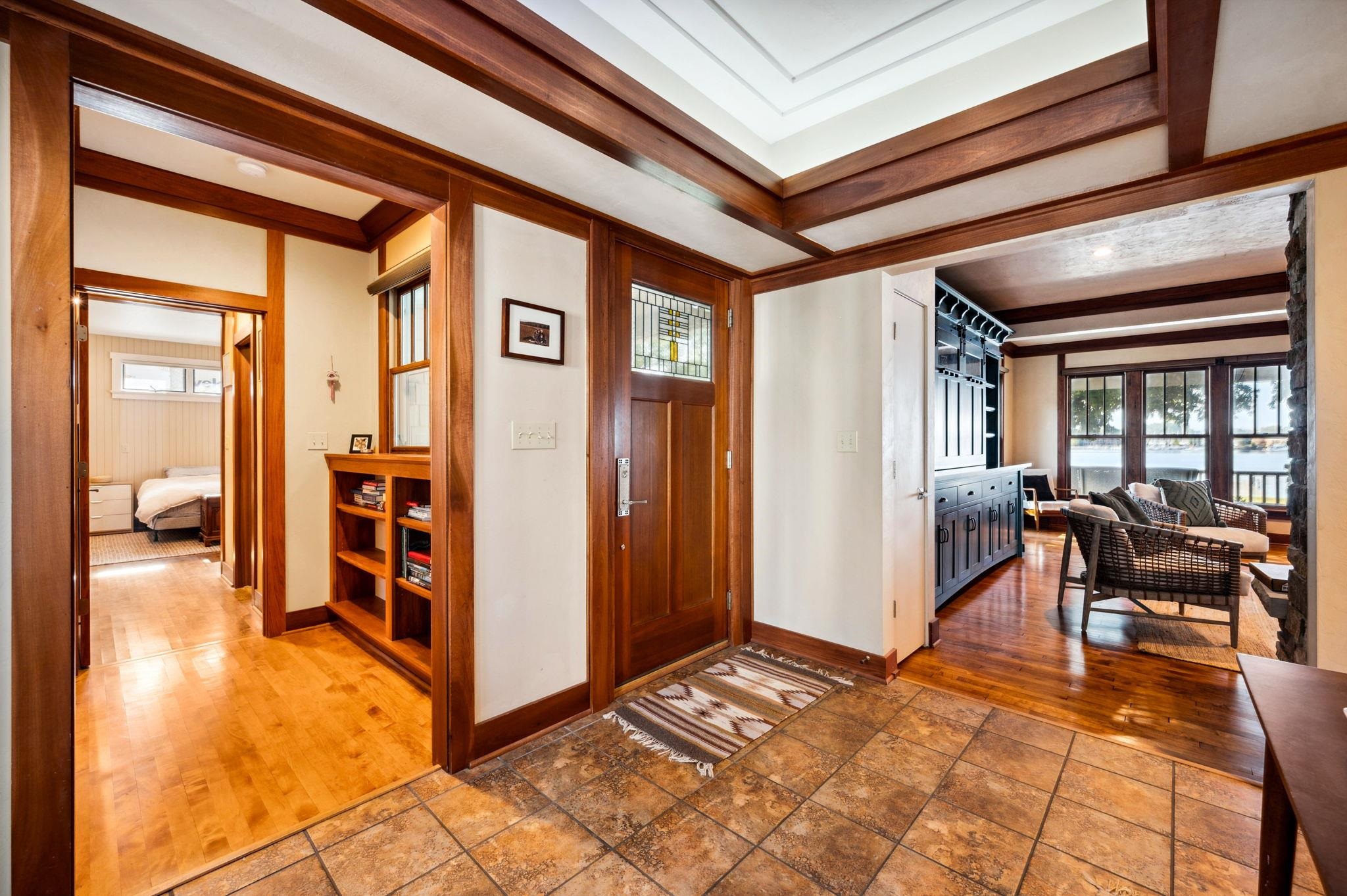 View from Foyer into living room and kitchen.