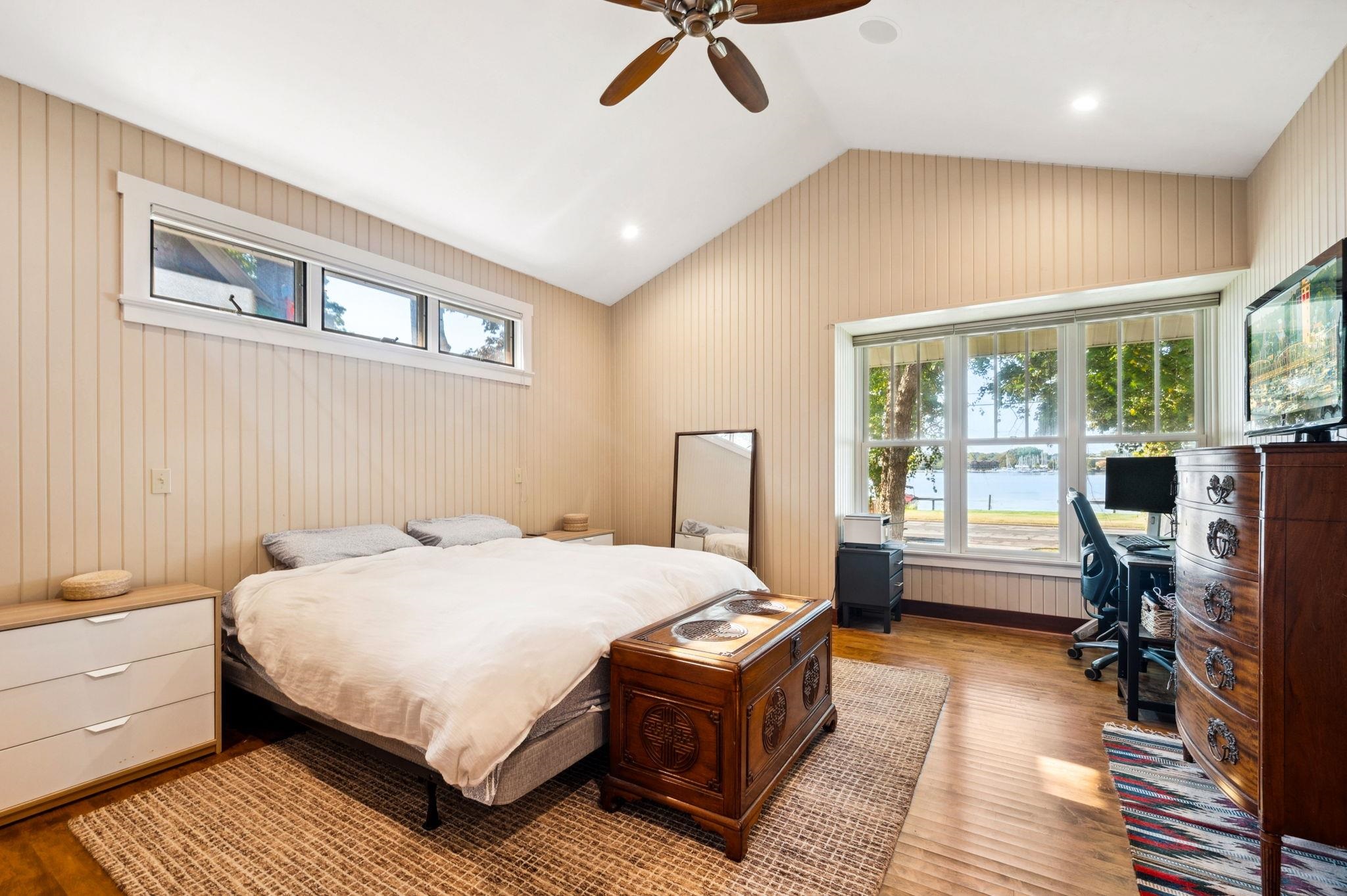 Primary bedroom with water views.