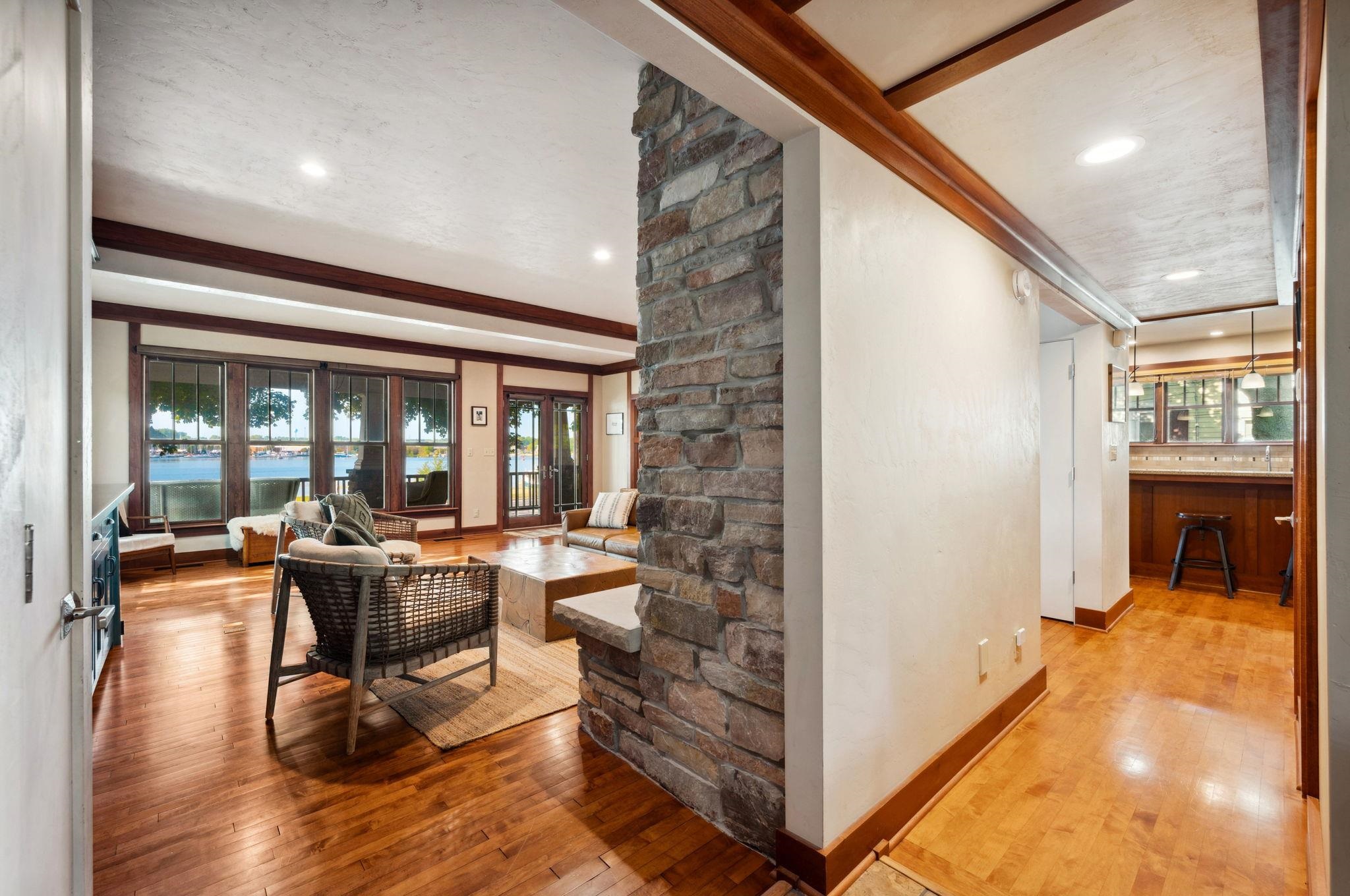 View into living room and kitchen from front foyer.