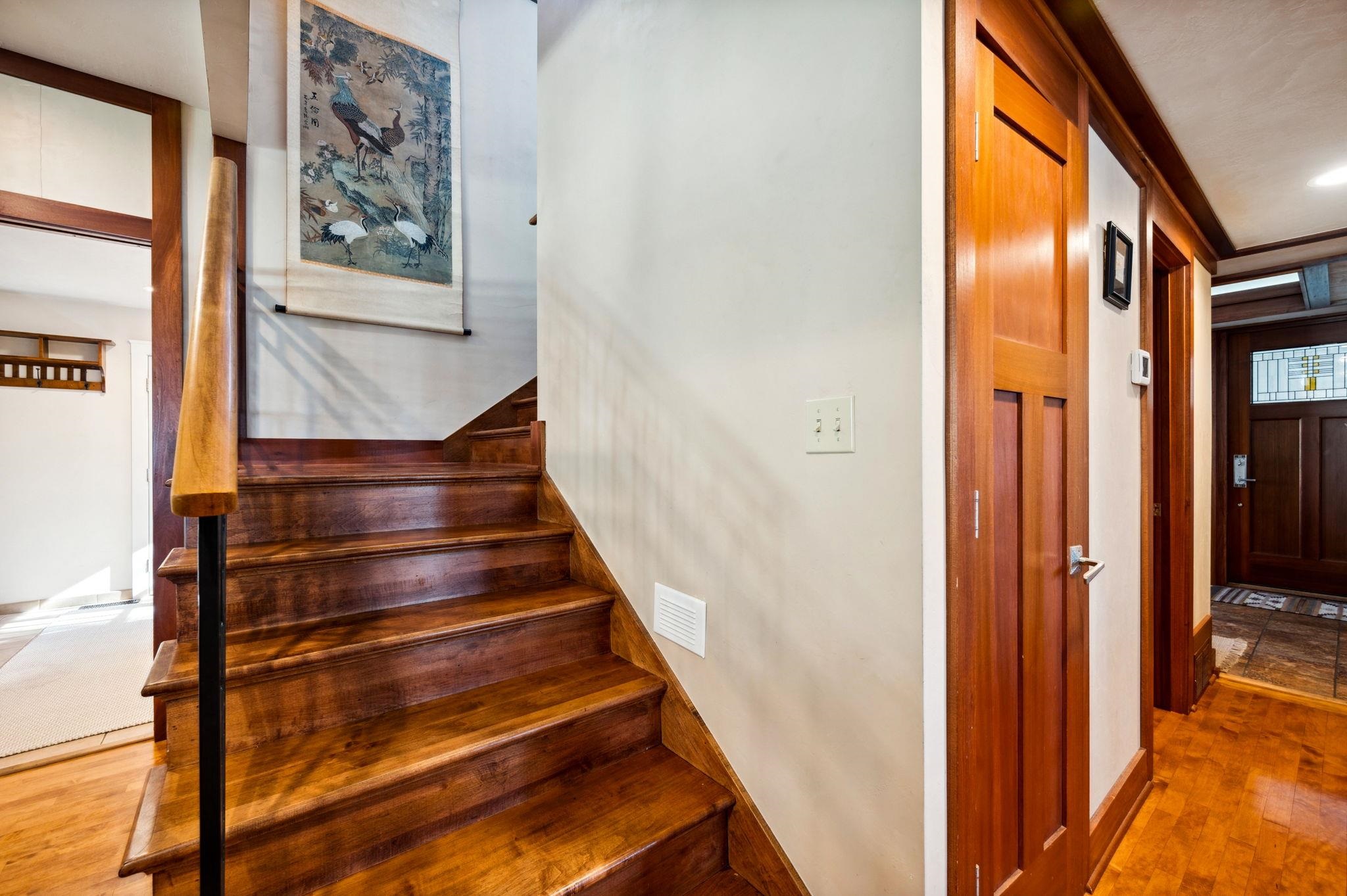 Stairway off of kitchen to 2nd level.