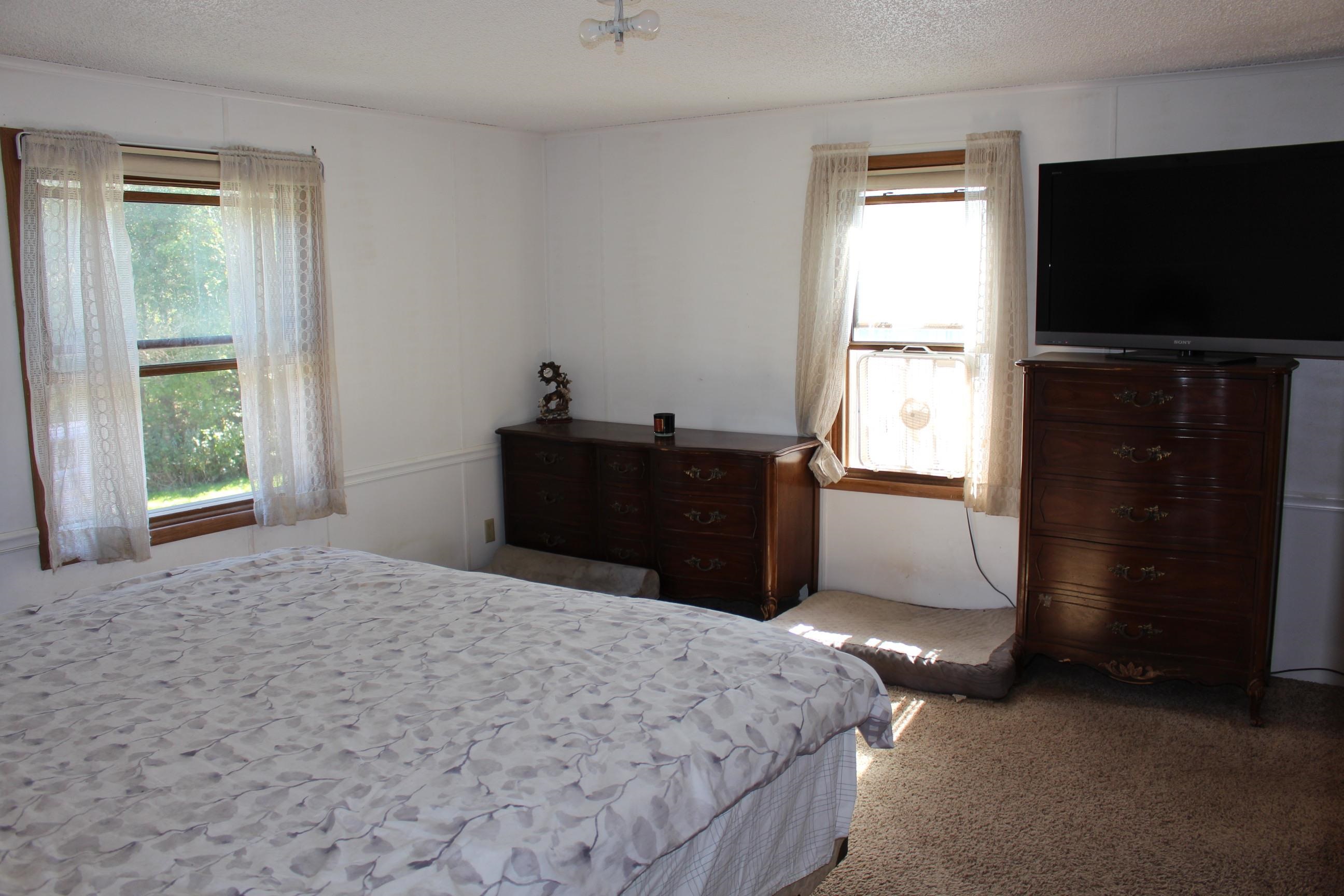 Large bedroom complete with a private bath