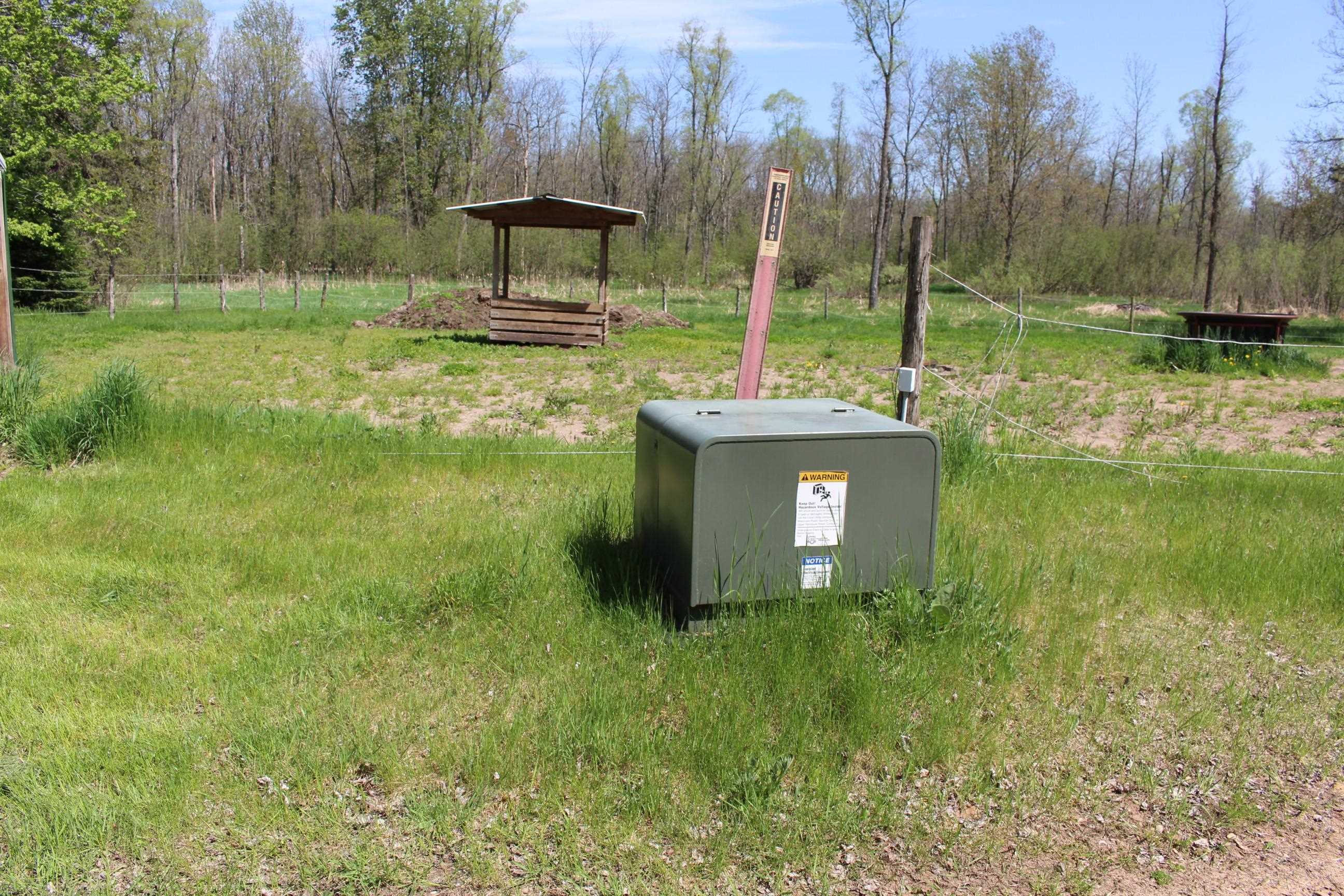 Includes 200 amp service box providing power to outbuildings