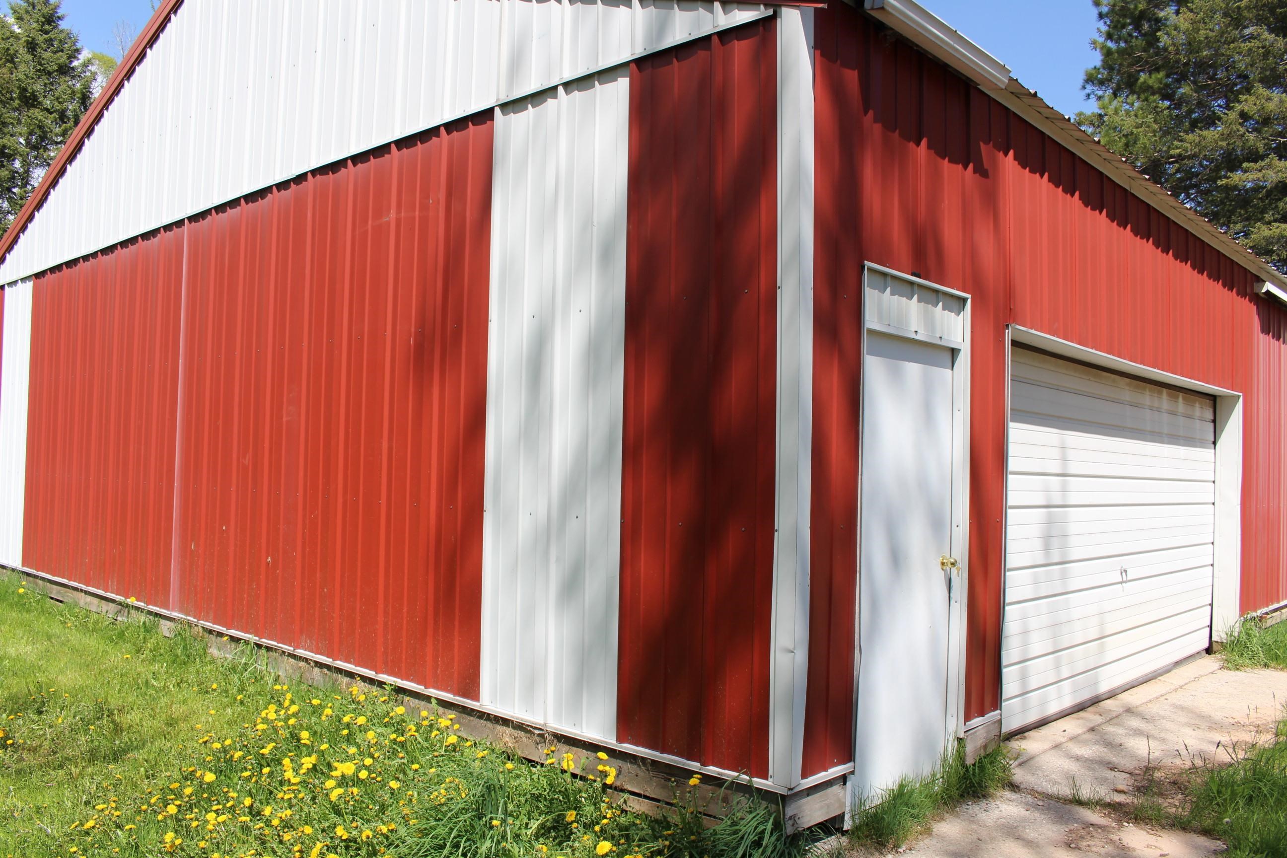 16'x7' overhead door with opener and 10'x12' slide door