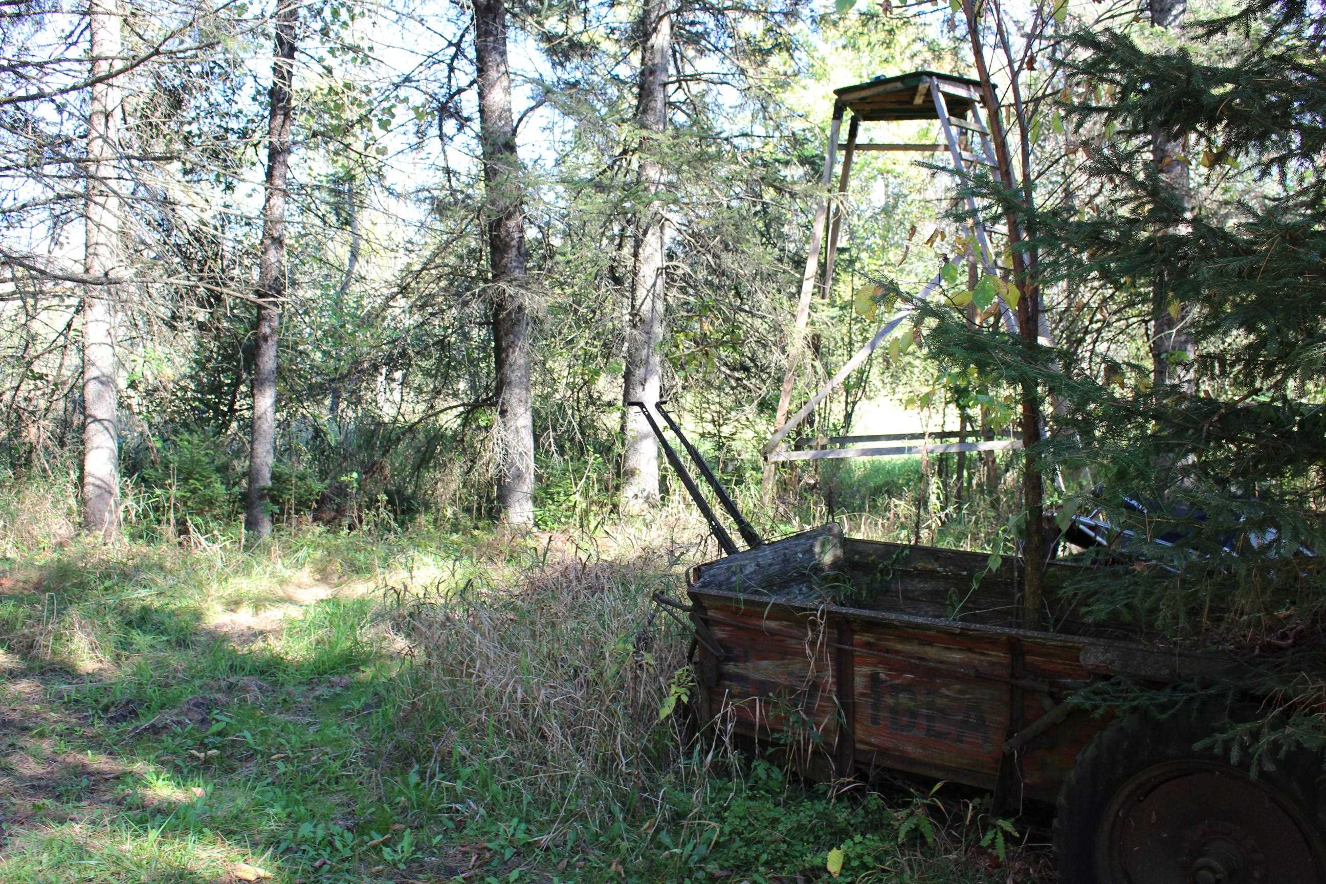 Adjacent to storage building.