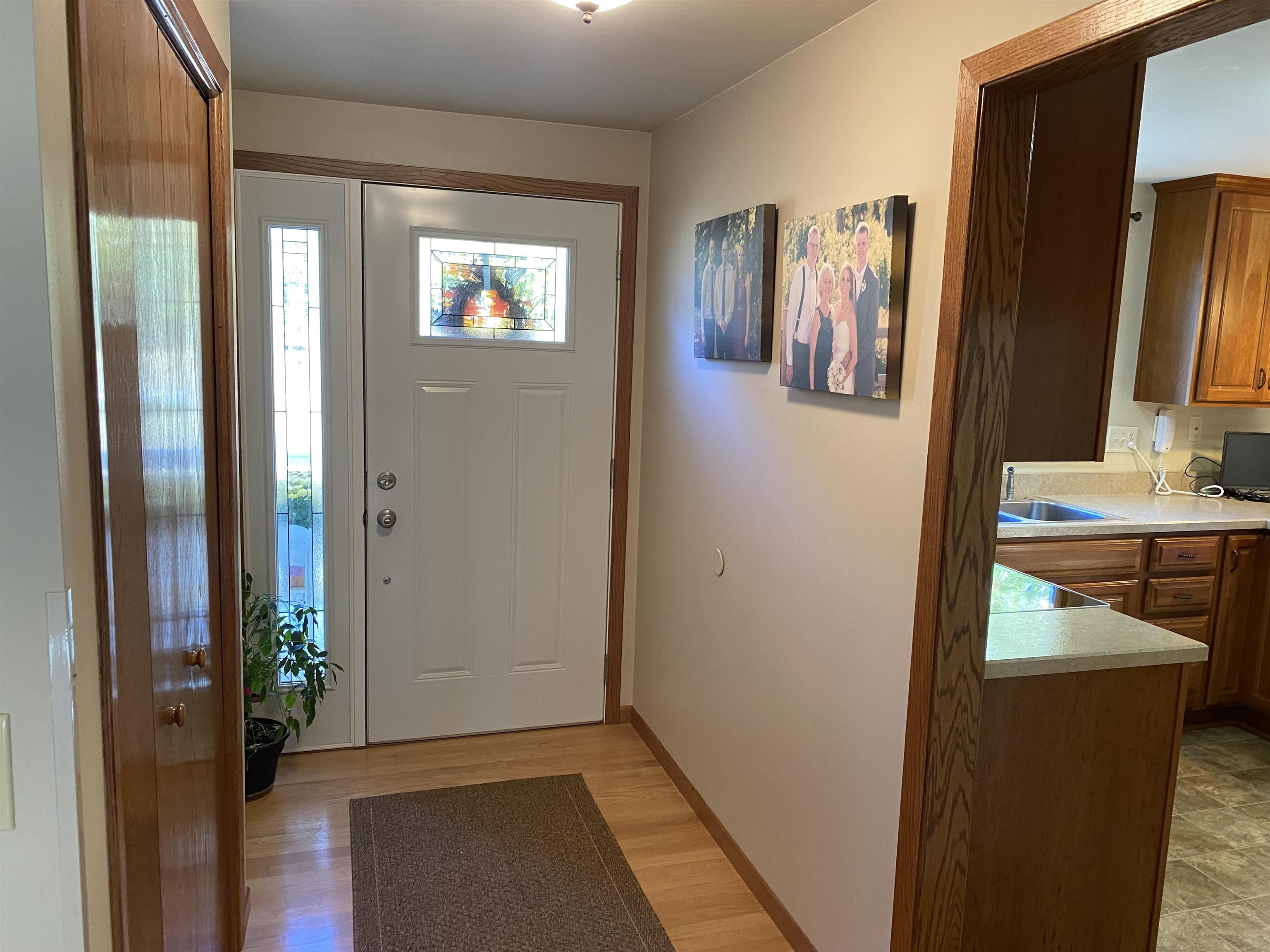 Front foyer w/ door to kitchen