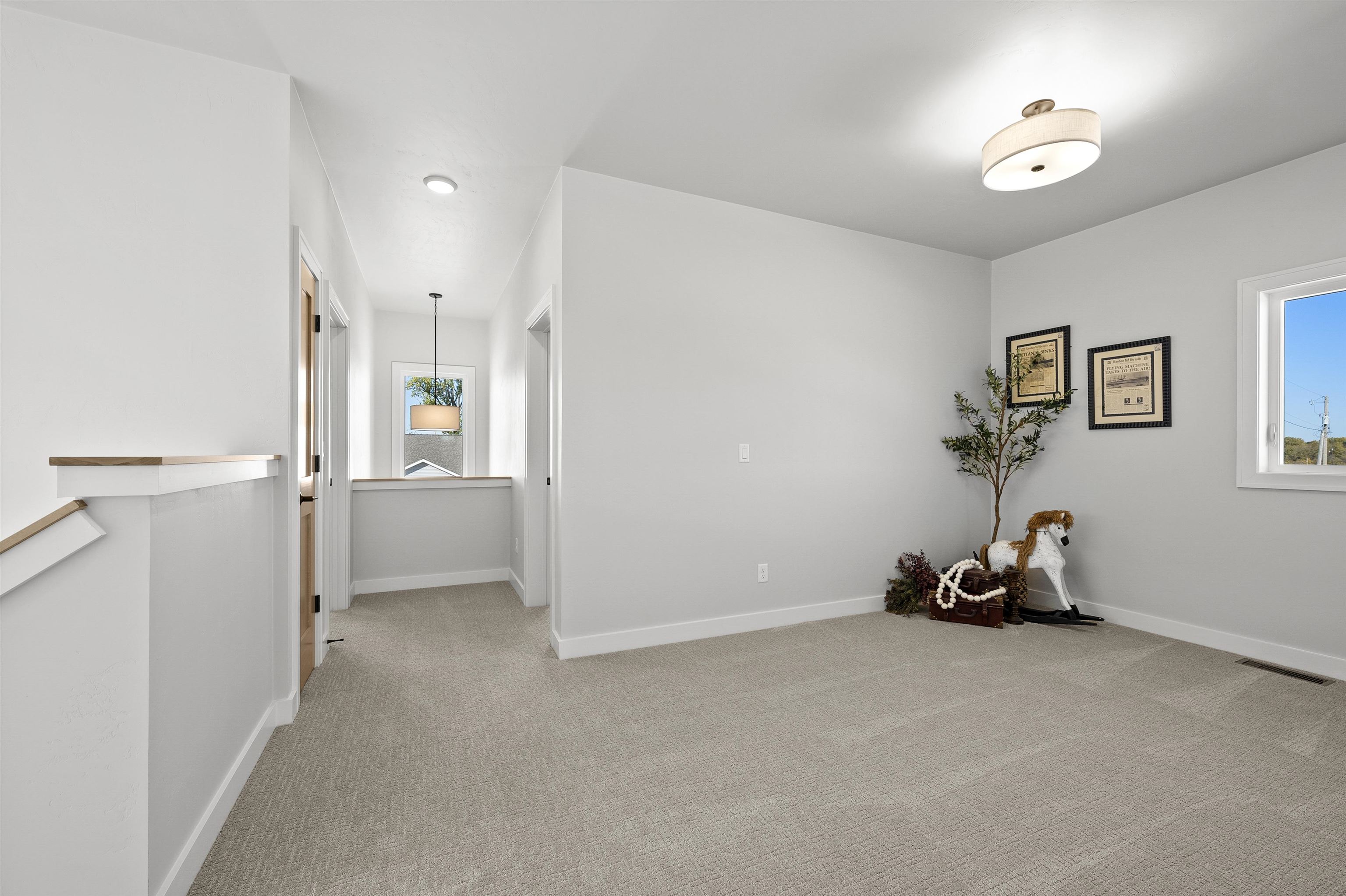 2nd floor loft area and overlooking 2-story foyer