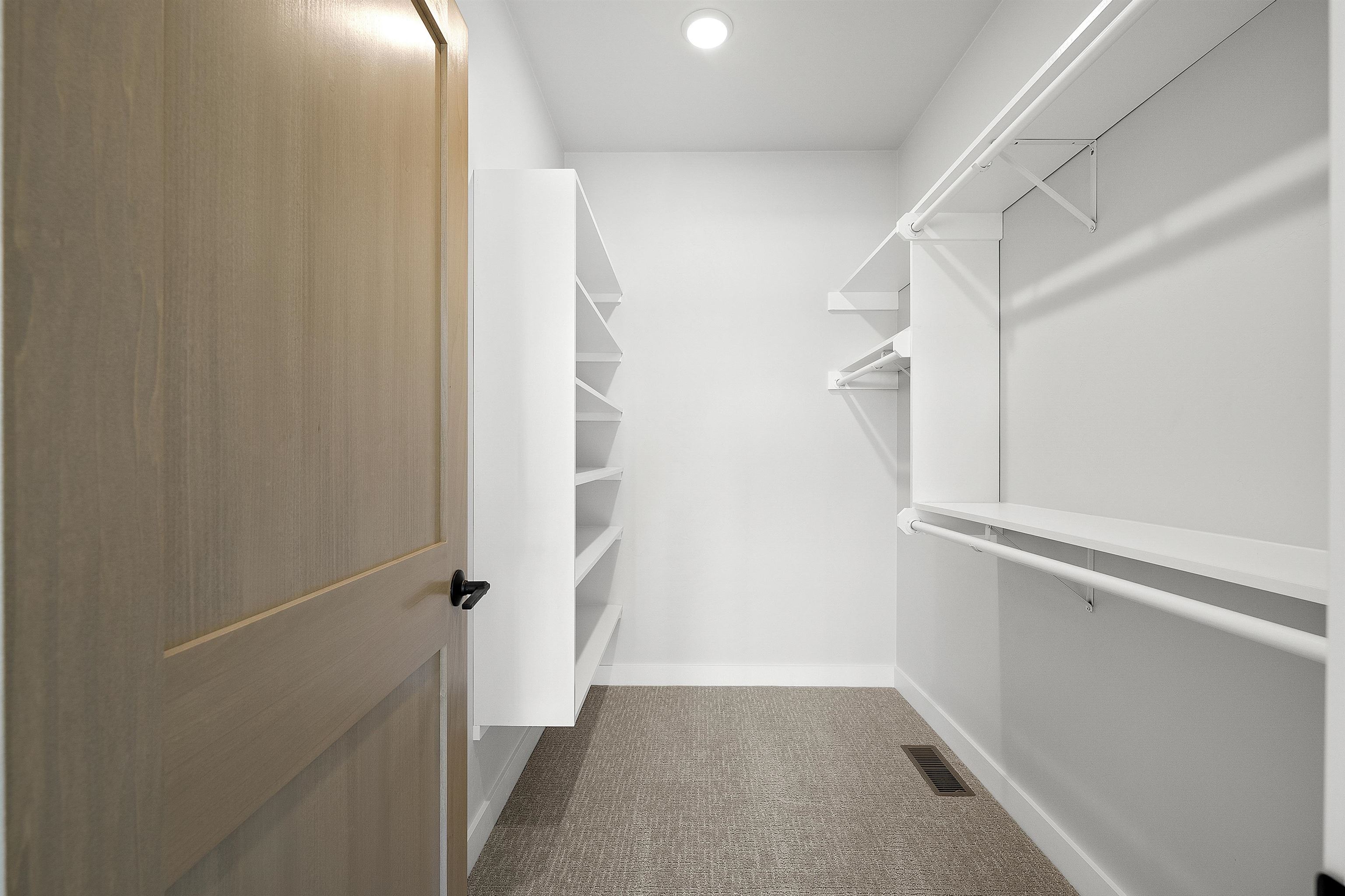 Primary Bedroom's walk-in closet